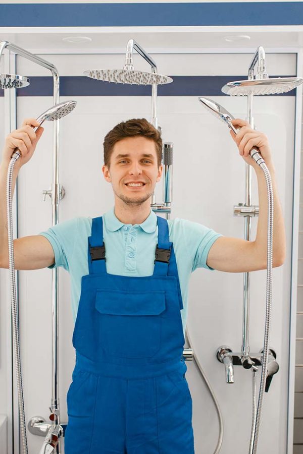 plumber-choosing-shower-in-plumbering-store-resize.jpg